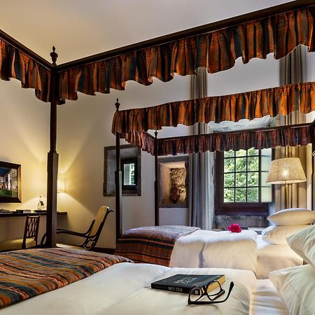 โปอูซาดา มอสเตอิโร เดอ กิมาราเอส- โมนิวเมนต์ โฮเต็ล Hotel กิมาไรส์ ภายนอก รูปภาพ A room at the hotel